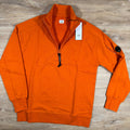 C.P. Company Diagonal Raised Half-Zip Lens Sweatshirt in Russet Orange