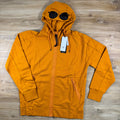 C.P. Company Diagonal Raised Fleece Goggle Hoodie in Desert Sun - Orange