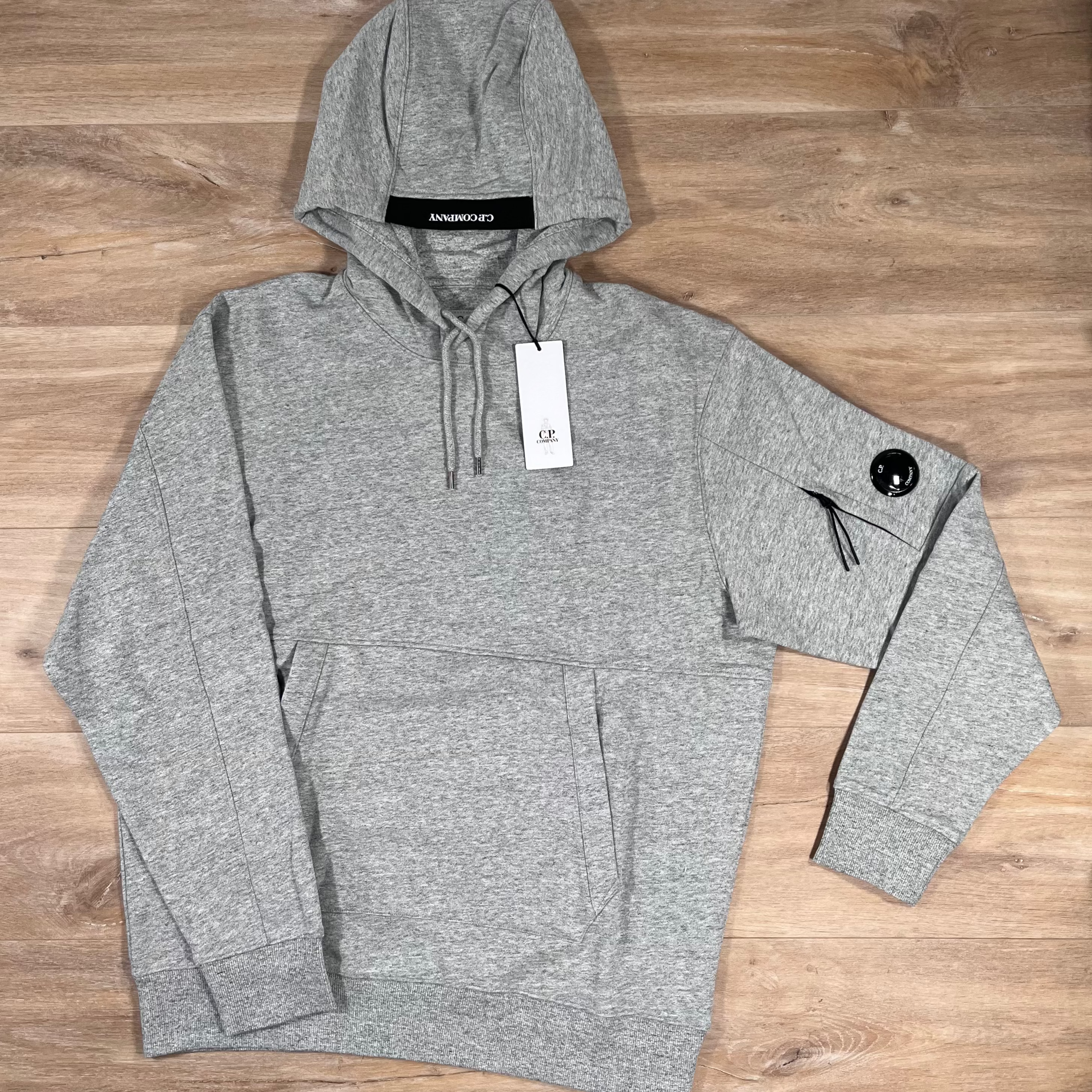 C.P. Company Diagonal Raised Fleece Lens Hoodie in Grey Melange